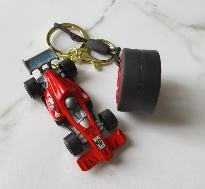 Formula-1 Racing Car & Tire Keychain Featuring a Combination of Two Car Elements