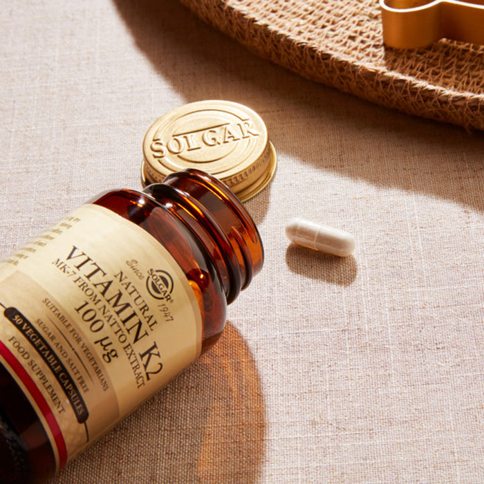 Solgar Vitamin K2 bottle with capsule.